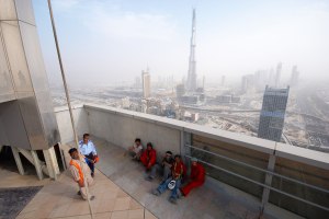 Dubai construction workers having their lunch break